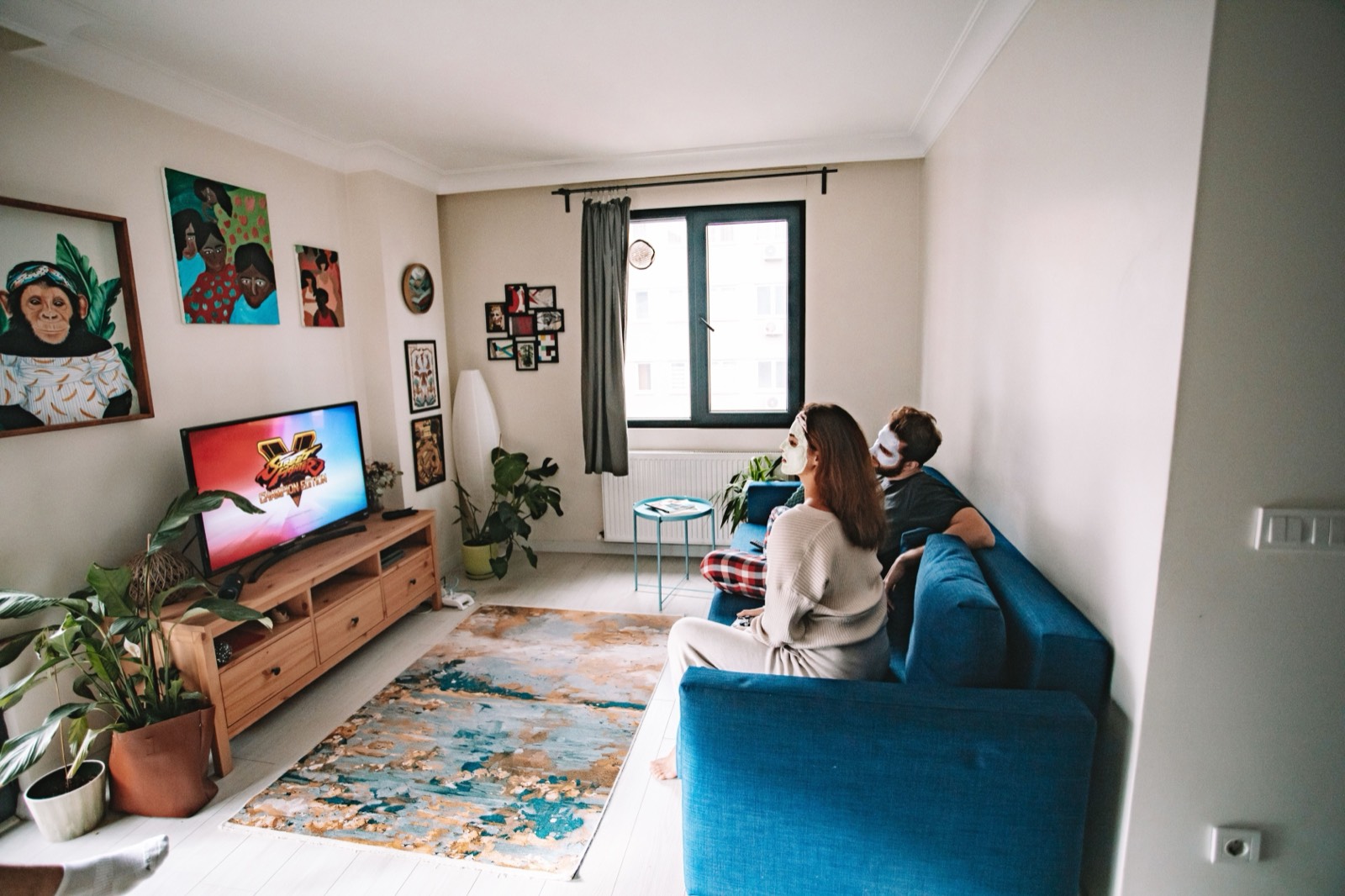 Home entertainment setup with IPTV streaming service running on a large screen TV